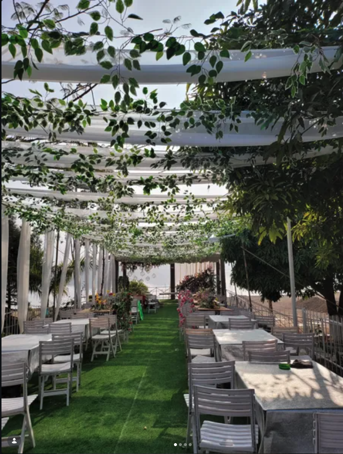 Vine-covered pergola outdoor dining